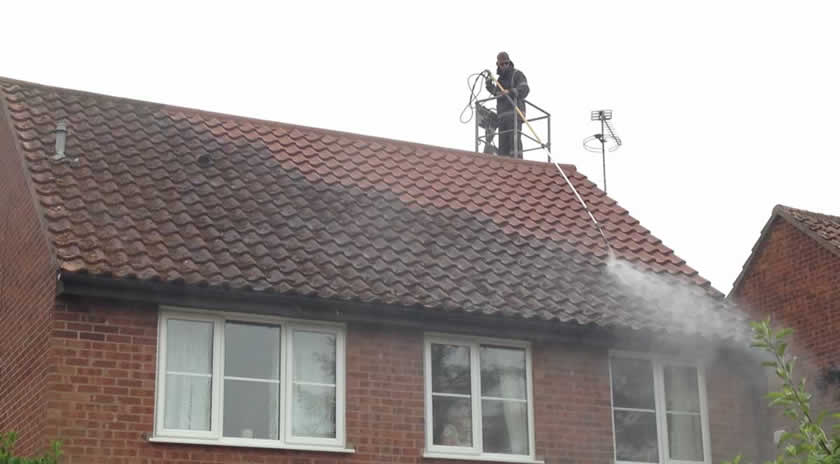 roof cleaners at work